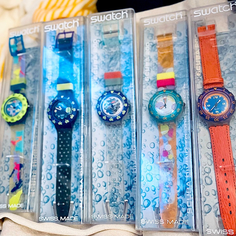 REDUCED to $65. 
8 NWT SWATCH SCUBA WATCHES $65. EACH in ORIGINAL CASES